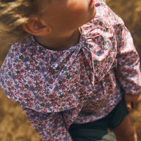 BLUSA LUCY FLOR ROSA Y AZUL